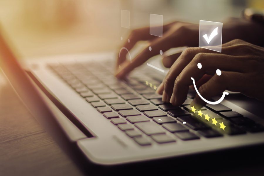 Businesswoman,Pressing,Smiley,On,Keyboard,Laptop,.customer,Service,Evaluation,Concept.